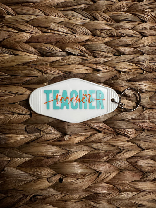 White Teacher Motel Keychain