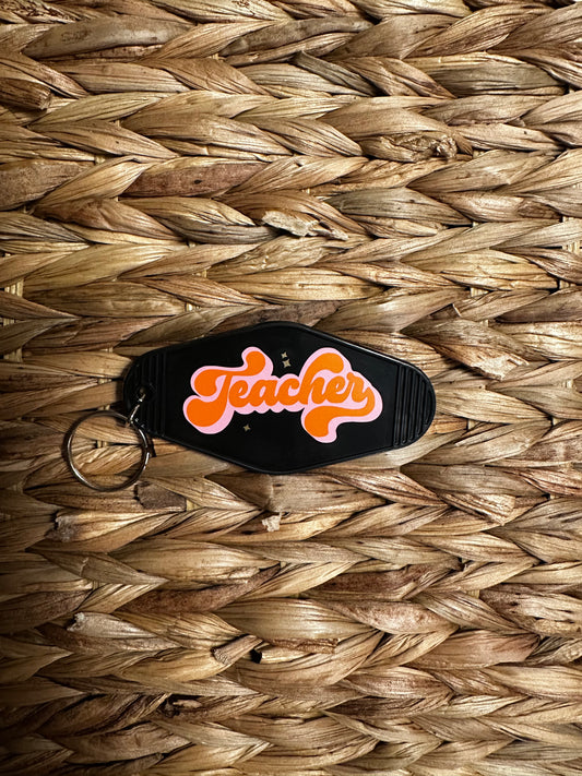Orange Teacher Black Motel Keychain