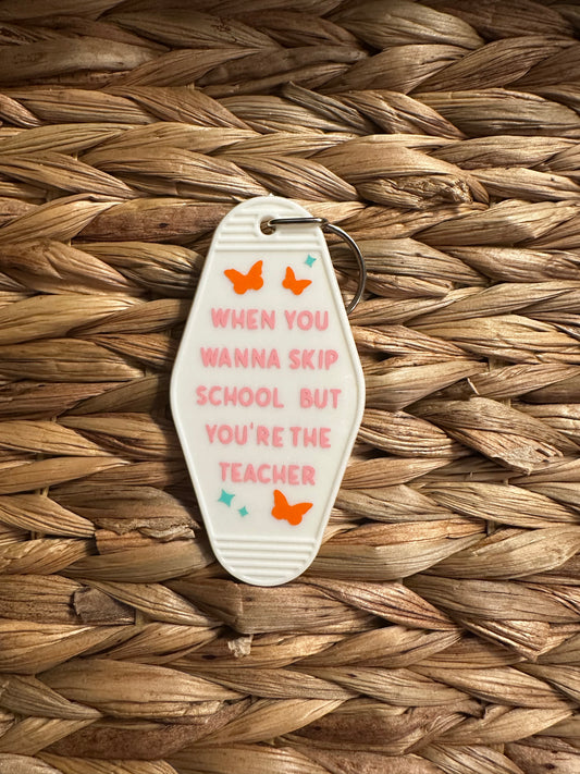 Skip School, Teacher White Motel Keychain